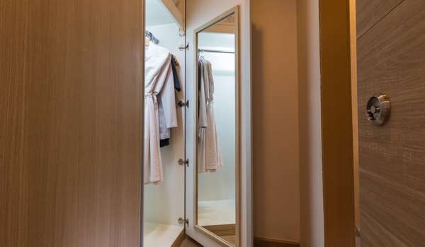  Hang a Mirror at the back of the Wardrobe Door